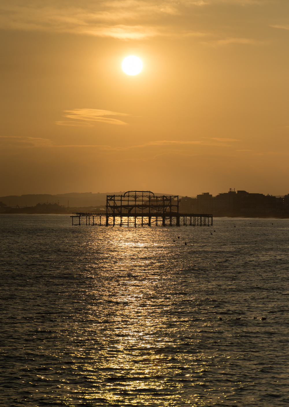 sunset shot of the brighton west pier